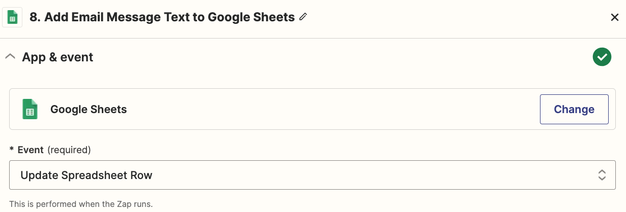 An action step in the Zap editor with Google Sheets selected as the action app and update spreadsheet row selected for the action event.
